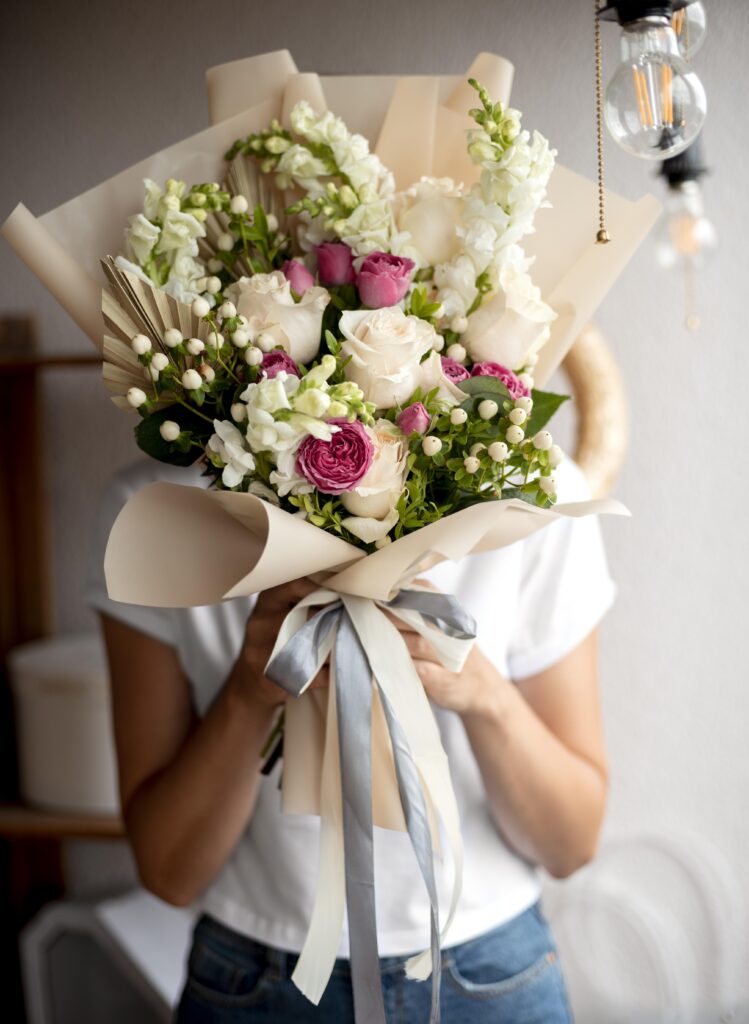 Medium Shot Hands Holding Flowers 749x1024